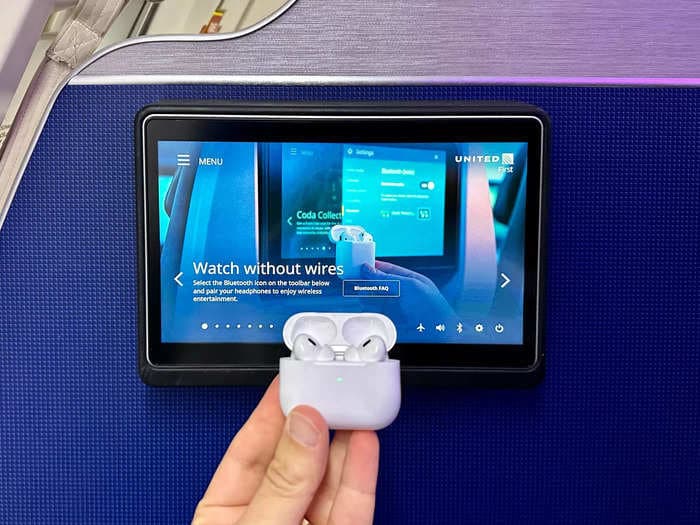 You can now use your AirPods to watch in-flight screens on some US airlines. Here's how to tell ahead of time if your flight will have Bluetooth.