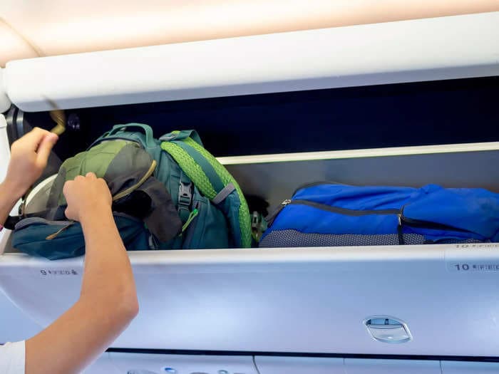 You have no right to the overhead bin by your plane seat if someone else got there first, travel influencer says