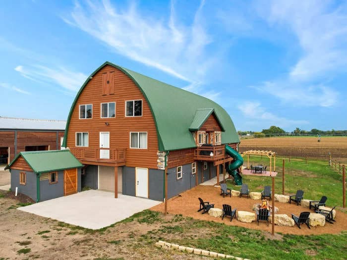 An arcade, tube slide, and 9-hole mini golf course have been added to this rural Wisconsin barn. It's now listed on Airbnb for $700 a night &mdash; take a look inside.