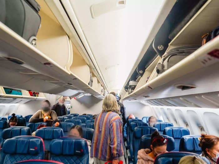 You're never entitled to overhead bin space on a plane in economy, former flight attendant says