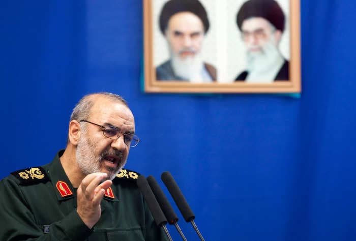 Iran warns it will react decisively if attacked and won't 'leave any threat unanswered' as US plans response to American troops deaths