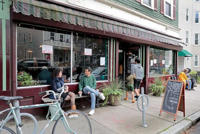 The key to happiness might be living within walking distance of a coffee shop