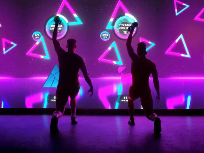 See inside the AI-powered fitness studio that's led by virtual trainers