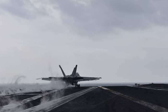 US Navy aircraft carrier going head-to-head with the Houthis has its planes in the air 'constantly,' strike-group commander says