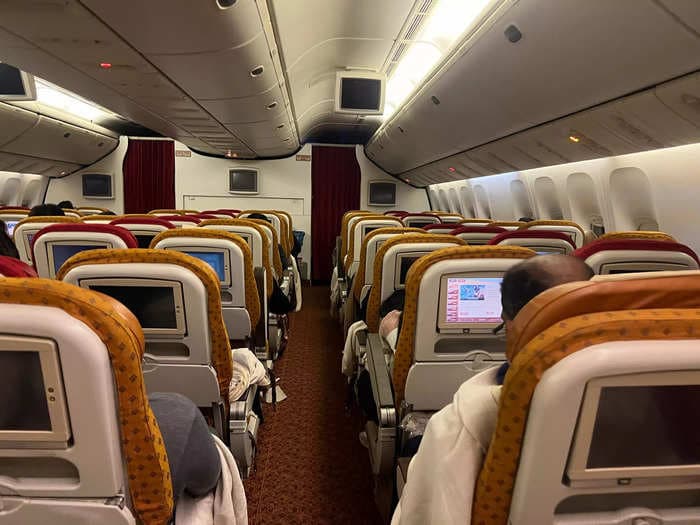 I flew economy on Air India's old Boeing 777-300ER for 15 hours. The broken seat, light, and TV made for a rough journey.