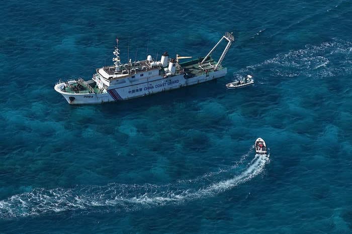 Chinese fishing vessels are going scorched earth and pumping cyanide into contested waters, Philippine fishing authority says