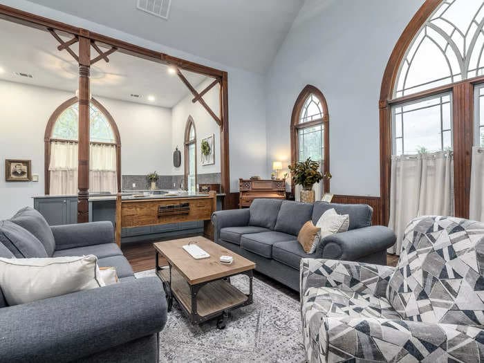 A 125-year-old church sat dilapidated for decades in a small Texas town, but now it's a cozy rental with a loft and original features. Take a look inside.