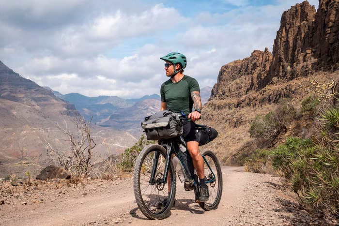 A bikepacker who's been on the road for 8 years says he's turned his lifestyle into a business that covers his costs — here's how.