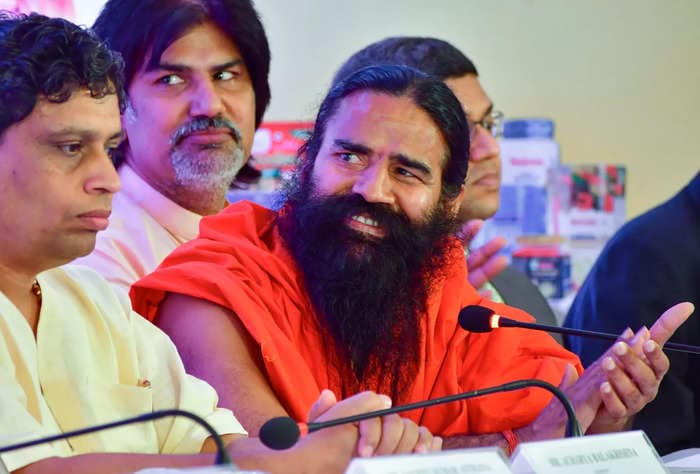 Patanjali ads case: Supreme Court asks Ramdev, Balkrishna to issue public apology; says not letting them off hook yet