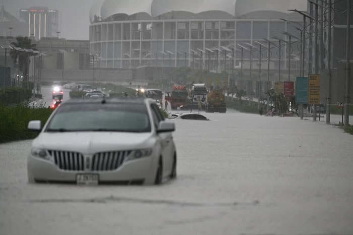 Photos show Dubai overwhelmed by torrential rain &mdash; and may expose the downsides of trying to control the weather