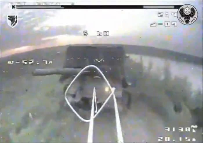 Video shows a Ukrainian drone finding an easy way around a Russian tank's 'turtle' defenses