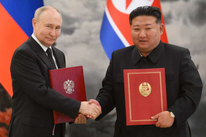 Putin and Kim Jong Un's wartime pact sees the two autocrats one step closer to creating a world 'safe for authoritarians,' expert says  