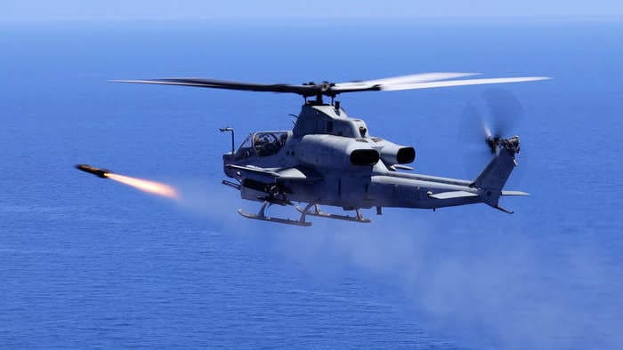 A US Marine Corps attack helicopter fired off a new 'fire and forget' missile for the first time in the Pacific, striking a moving vessel