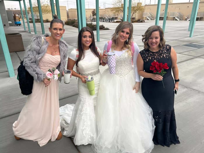 A school told its staff to wear something from the back of their closet, so 2 teachers dug out their wedding dresses