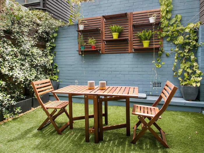 Interior designers share 11 low-cost ways to make a small outdoor space feel bigger