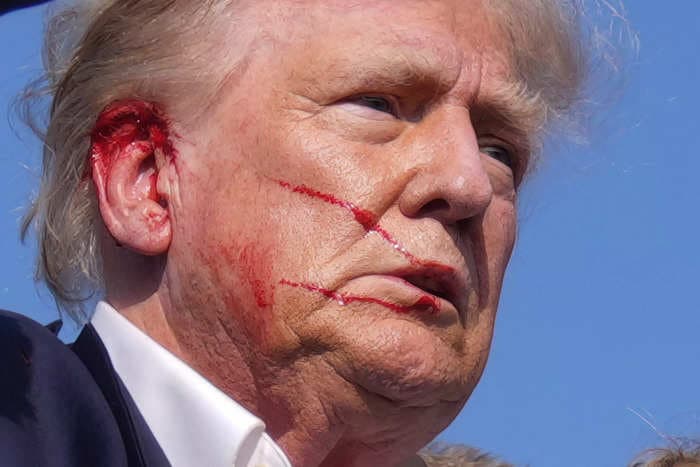 The man who photographed a bloodied and defiant Trump says he 'knew it was a moment in American history that had to be documented'