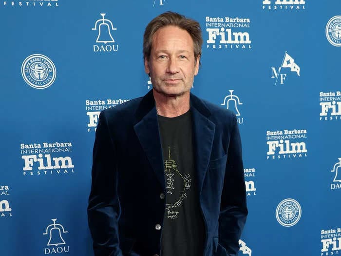 David Duchovny says a director used a megaphone to tell him when to orgasm during his first sex scene in 1991