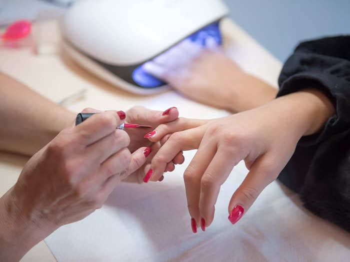 10 things you should never do in a nail salon, according to salon owners and nail techs 