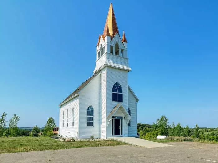 Millennials transformed a rundown $115,000 church into a modern Airbnb that makes $40,000 a year. See inside.