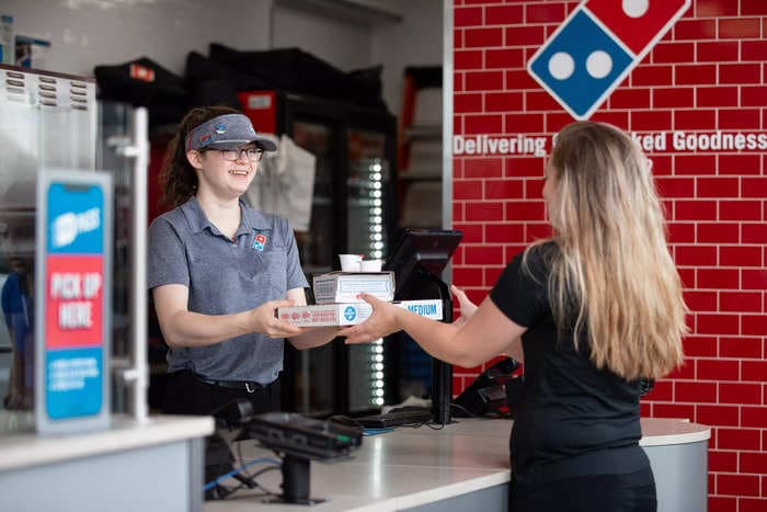 Domino's CEO says customers are picking up their own pizzas, and it reveals a bleak reality about the economy