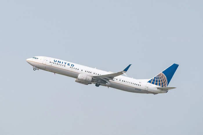 A United flight diverted after a passenger's medical issue caused a 'biohazard' that made the crew vomit