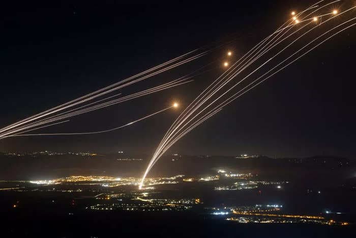 Video shows Israel's Iron Dome missile defense system intercepting Hezbollah rockets overnight as fears over wider conflict mount