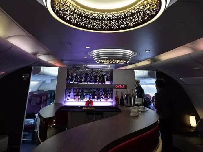 Qatar CEO says the airline isn't ditching its Airbus A380s just yet. See inside the superjumbo, complete with a bar and lounge. 