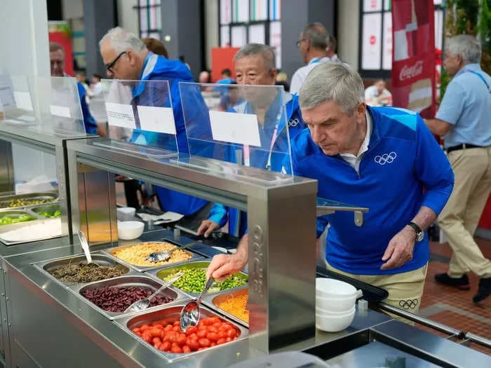 Take a look inside the Paris Olympics dining hall, featuring a massive salad bar and TikTok-famous chocolate muffins