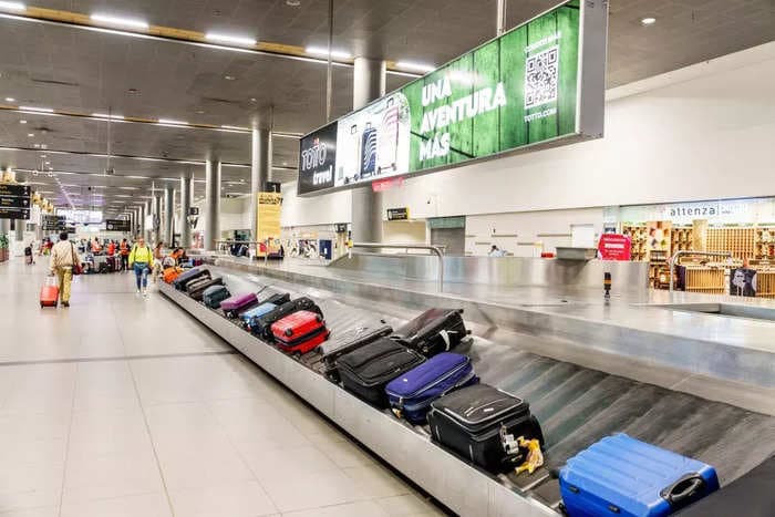 A woman died after getting trapped in a baggage carousel at Chicago O'Hare Airport