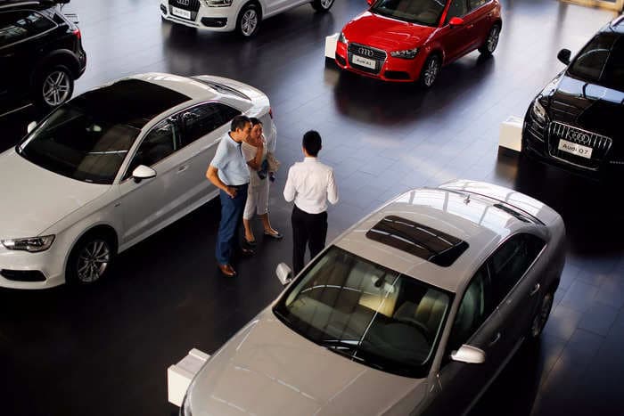 A 'bifurcated economy' is keeping some car buyers out of the market