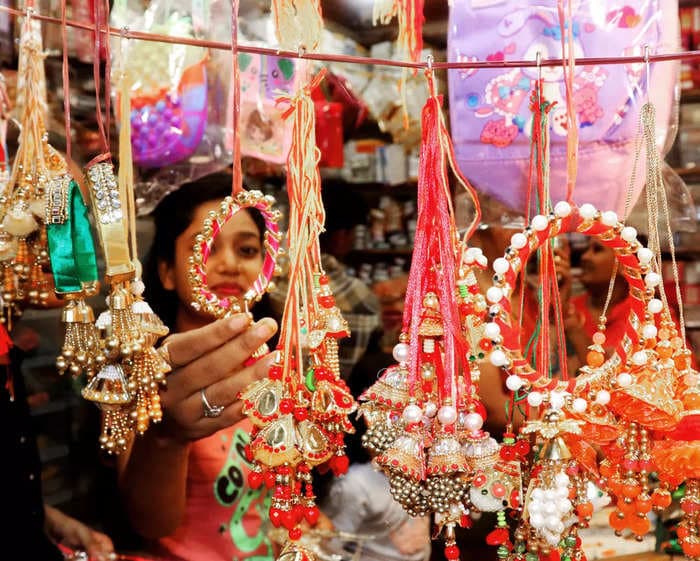 Women don tiger masks to tie rakhis to men in villages, towns surrounding MP's Pench Tiger Reserve