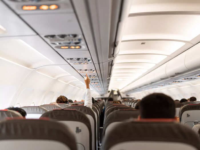 4 mistakes to stop making on a plane, according to an etiquette coach