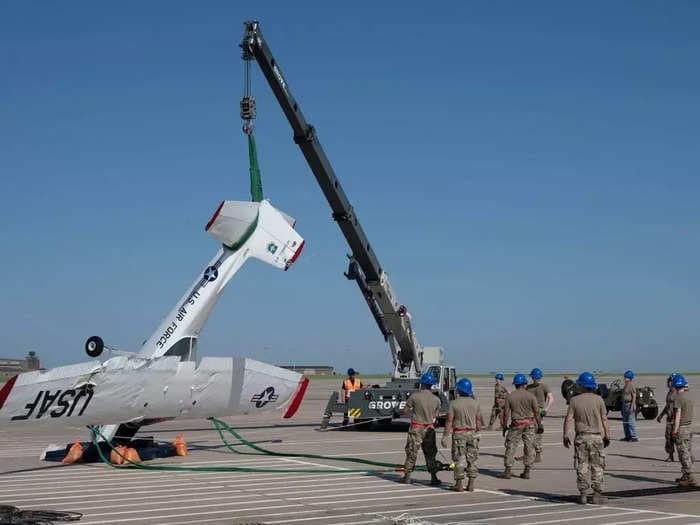 Photos show the aerial acrobatics before unexpected storms ended a big military airshow