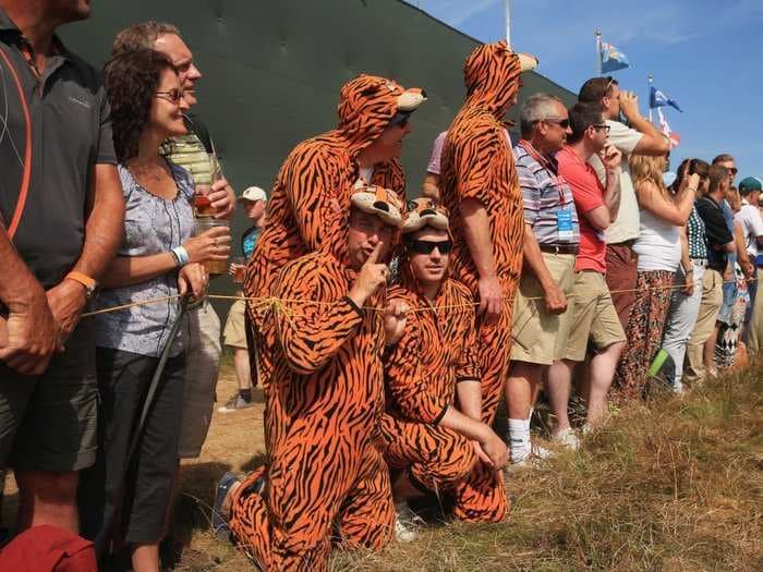 Fans Dressed As Tigers Are Following Tiger Woods At The British Open