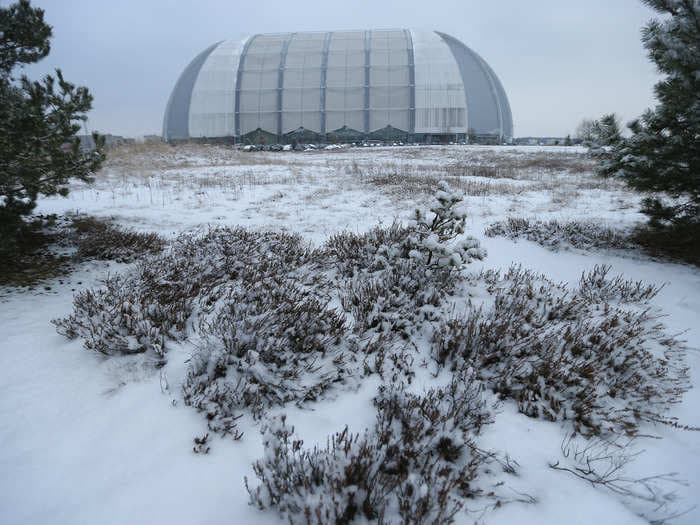 There's A Giant Tropical Resort Inside This Old Soviet Airplane Hangar 