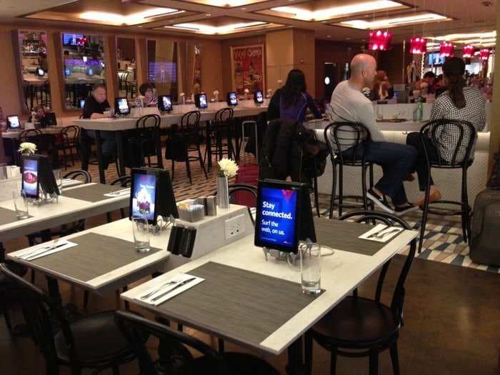LaGuardia's Delta Terminal Is Packed With iPads As Far As The Eye Can See
