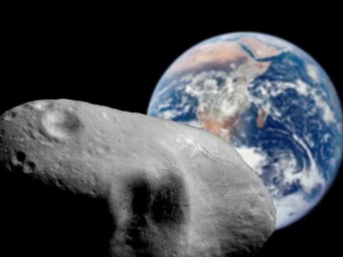 EARTH SURVIVES NEAR PASSAGE OF ASTEROID