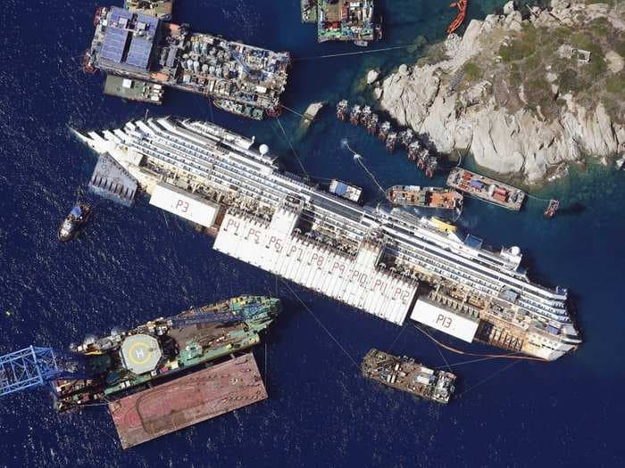 This Incredible Photo Shows That The Workers Flipping The Shipwrecked Costa Concordia Have A Huge Job Ahead Of Them