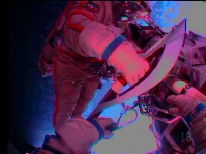 Incredible Image Of The Olympic Torch On A Historic Spacewalk