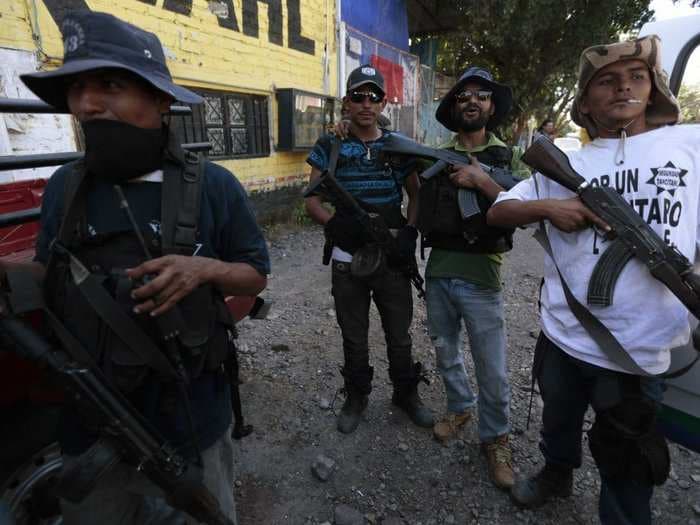 Insane Photos Show Mexican Vigilantes Battling A Drug Cartel For Control Of A City