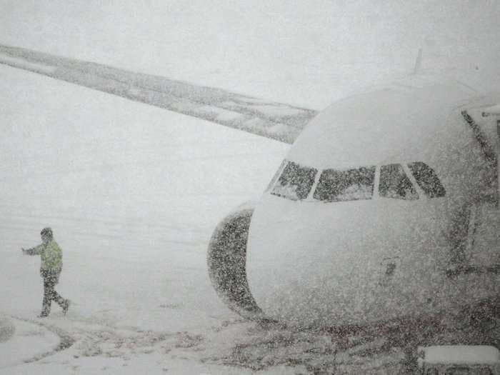 Thousands Of US Flights Cancelled As Snow Hits Northeast