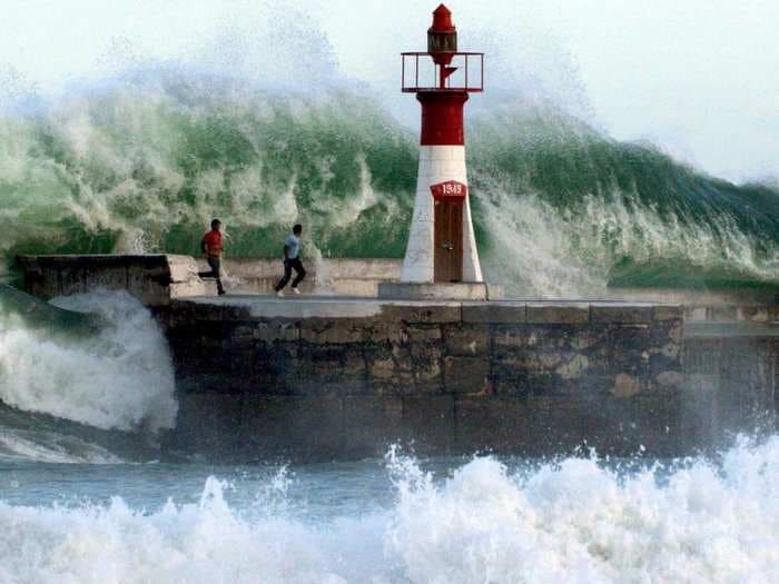 These Pictures Of Monster Waves Crashing On People Will Make You Thankful For Being Warm And Dry