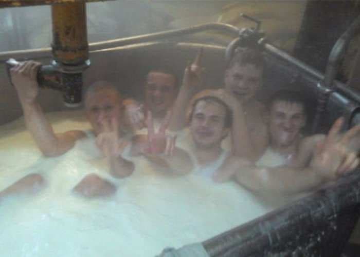 This Photo Of Russian Cheese Factory Workers Bathing In Milk Has Spurred A Criminal Investigation