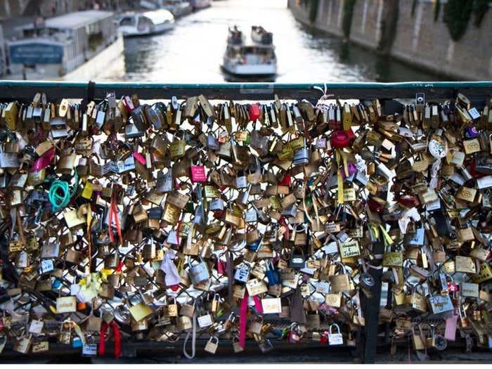 A Famous Paris Bridge Has Partially Collapsed Under The Weight Of Tourists' 'Love Locks'