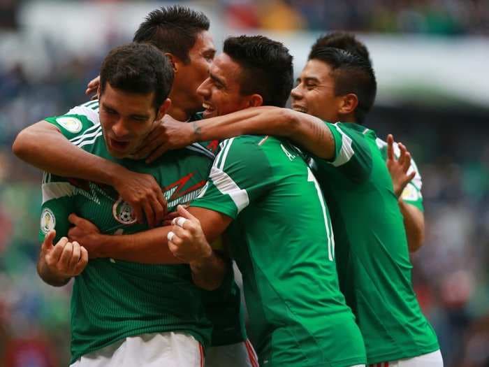 LIVE! Mexico Takes On Cameroon In A Driving Rainstorm At The World Cup