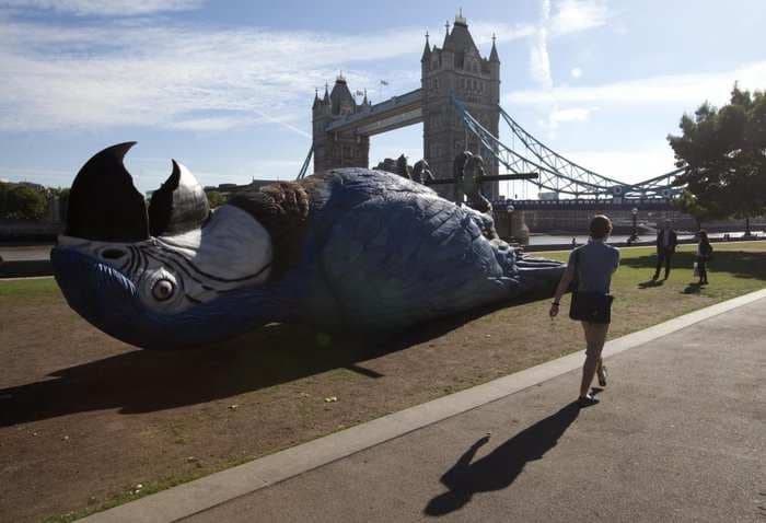Why A British TV Station Dropped This Giant Dead Parrot Sculpture In The Middle Of London