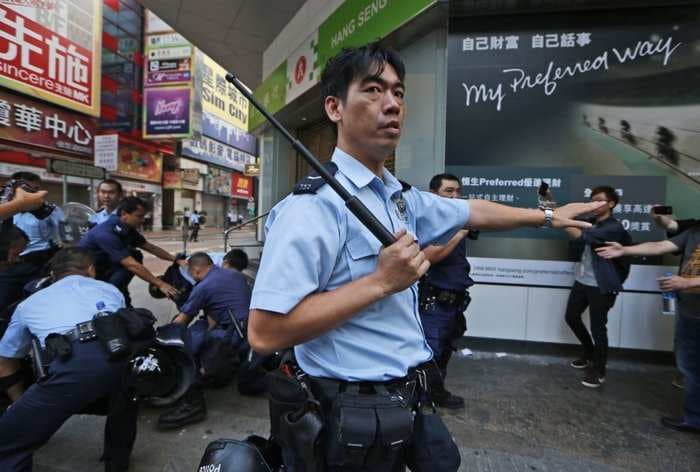 Thousands Of Police Officers Are Cracking Down On Hong Kong's Democracy Protestors