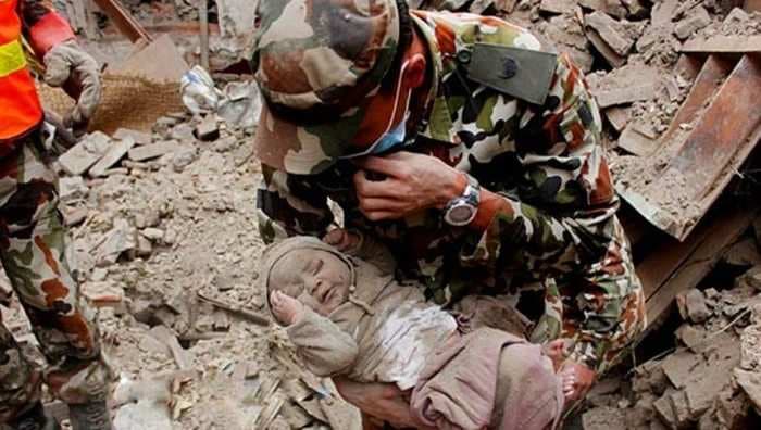 Nepal Earthquake: Miracle! A 4-month old baby pulled out alive from rubble, 22 hrs after earthquake