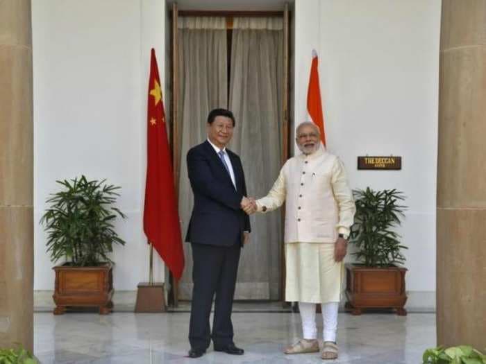 Modi and Xi talk about greater
Hindi-Chini ties