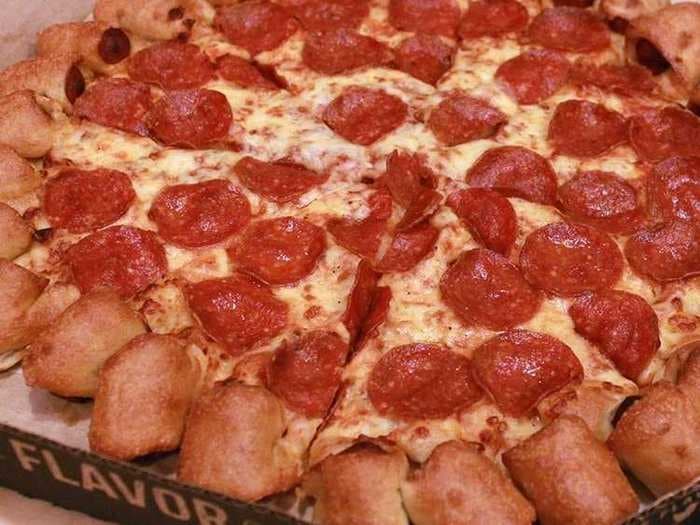 Turns out Pizza Hut's new hot dog stuffed crust pizza is a 'horrible tragedy'